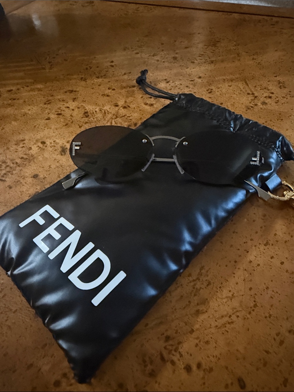 Fendi Black Rimless Sunglasses with Silver Accents